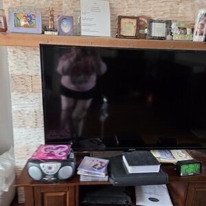 Samsung Black Flat Screen TV with Slim Bezel